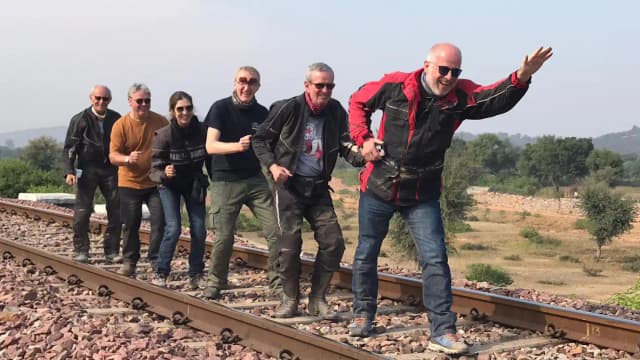 Group of travellers enjoying an adventure during a motorcycle tour through Rajasthan with Indian Rides